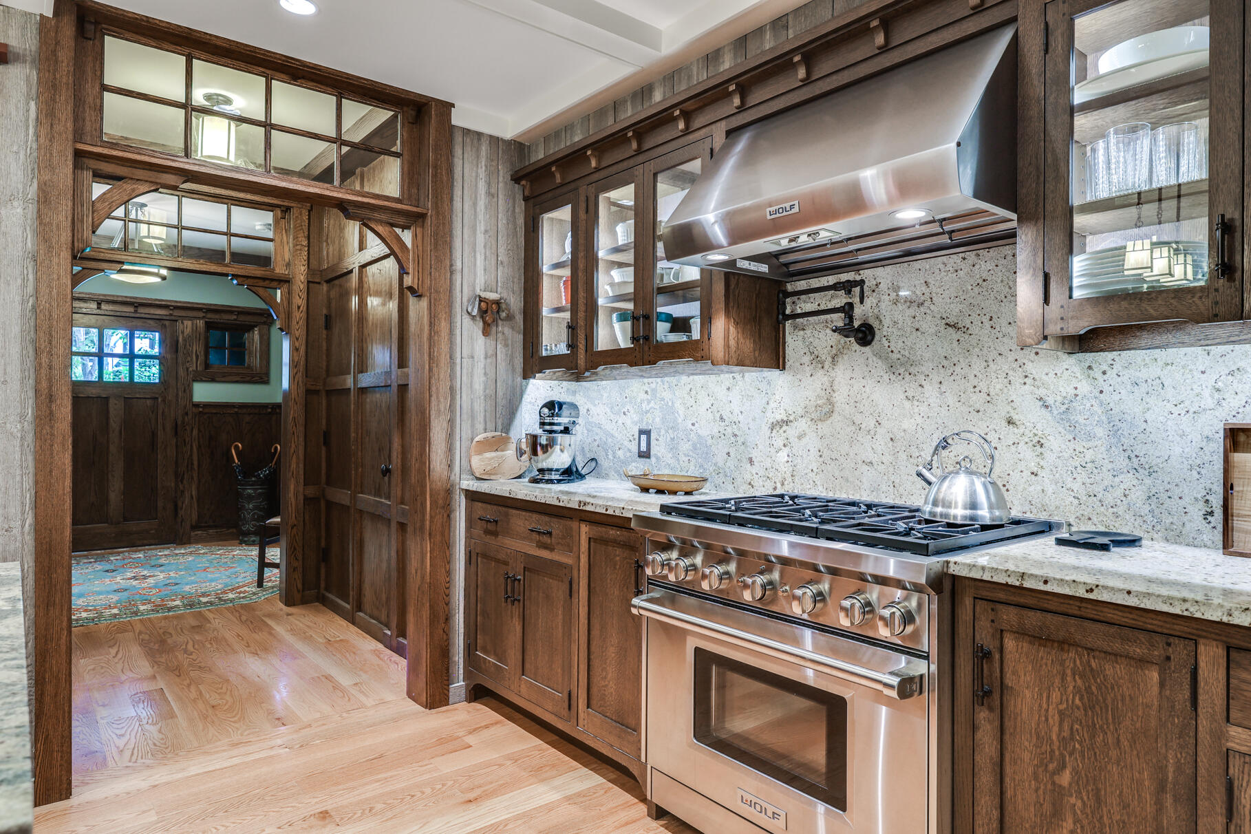 12 Somerset Road Provincetown, MA 02657 - Photo 5 of 38 a kitchen with stainless steel appliances granite countertop a stove and a wooden cabinets