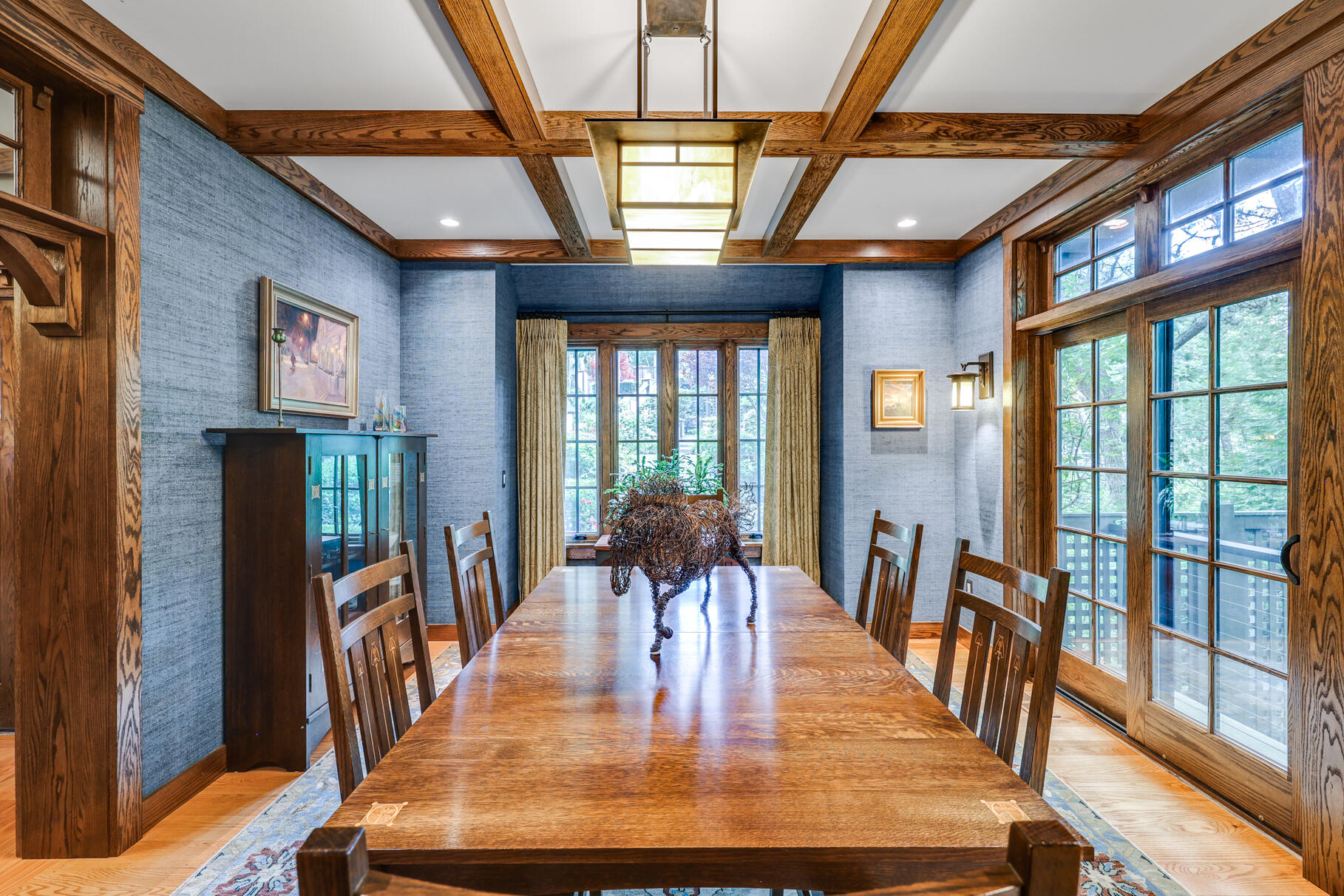 12 Somerset Road Provincetown, MA 02657 - Photo 8 of 38 a dining room with furniture a chandelier and wooden floor