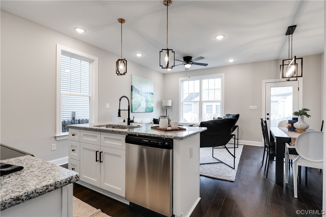 1504 Decatur Street Richmond, VA 23224 - Photo 13 of 37 a kitchen with cabinets appliances and a dining table