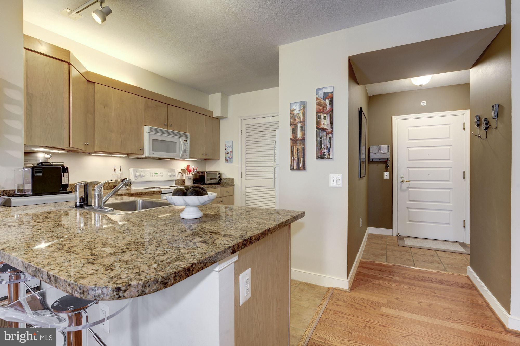 616 E Street Northwest, Unit 321 Washington, DC 20004 - Photo 6 of 24 Kitchen and Foyer
