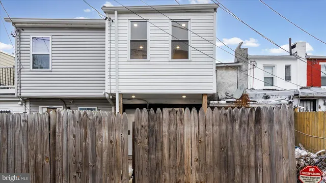 a view of a balcony with furniture