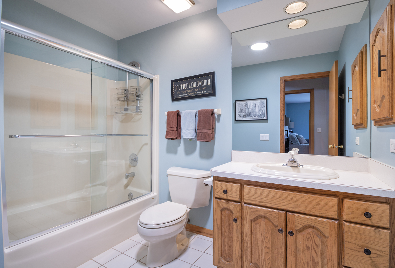 809 Tide Court Wheeling, IL 60090 - Photo 16 of 21 a bathroom with a sink a toilet and shower