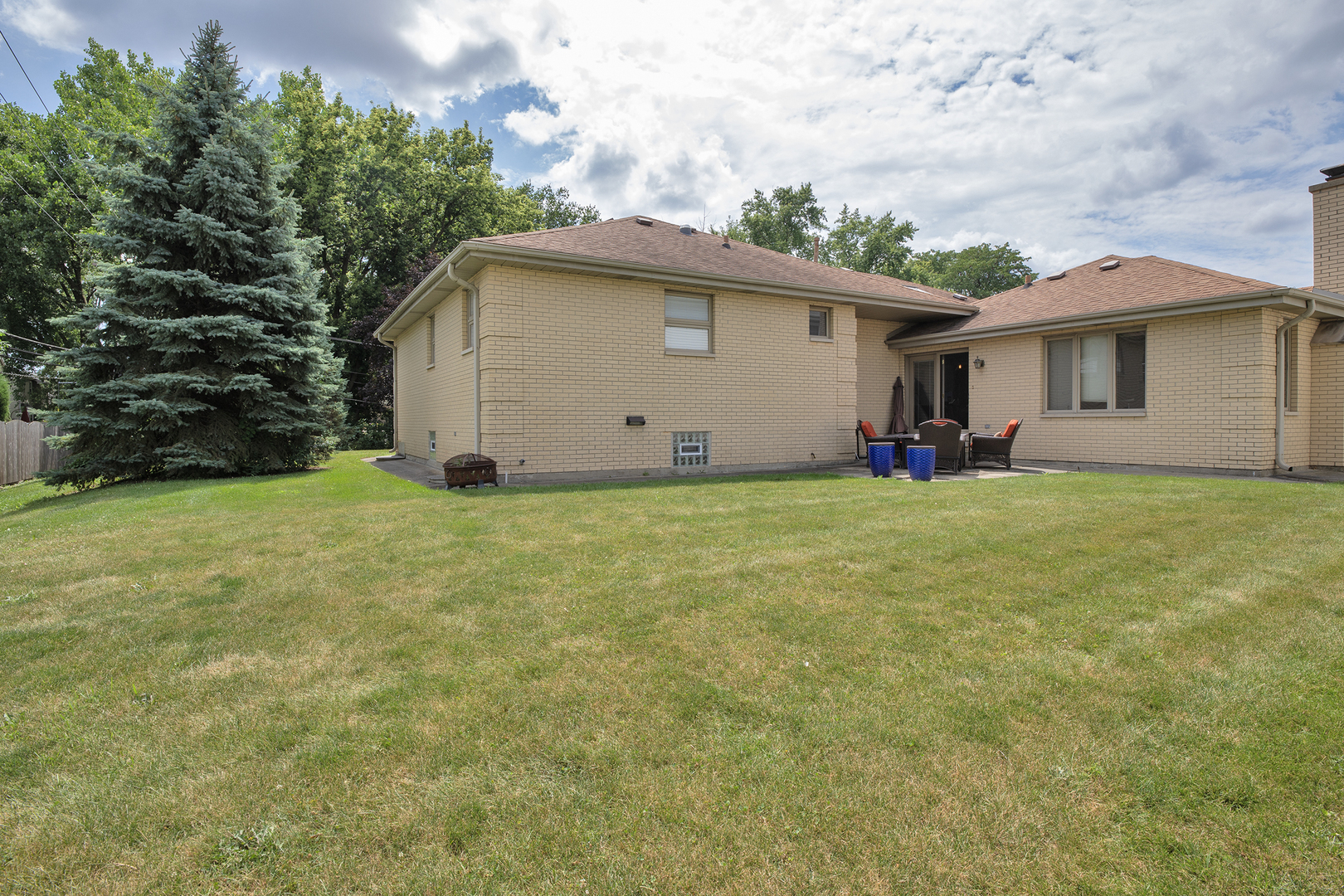 809 Tide Court Wheeling, IL 60090 - Photo 21 of 21 a view of a house with yard and a garage