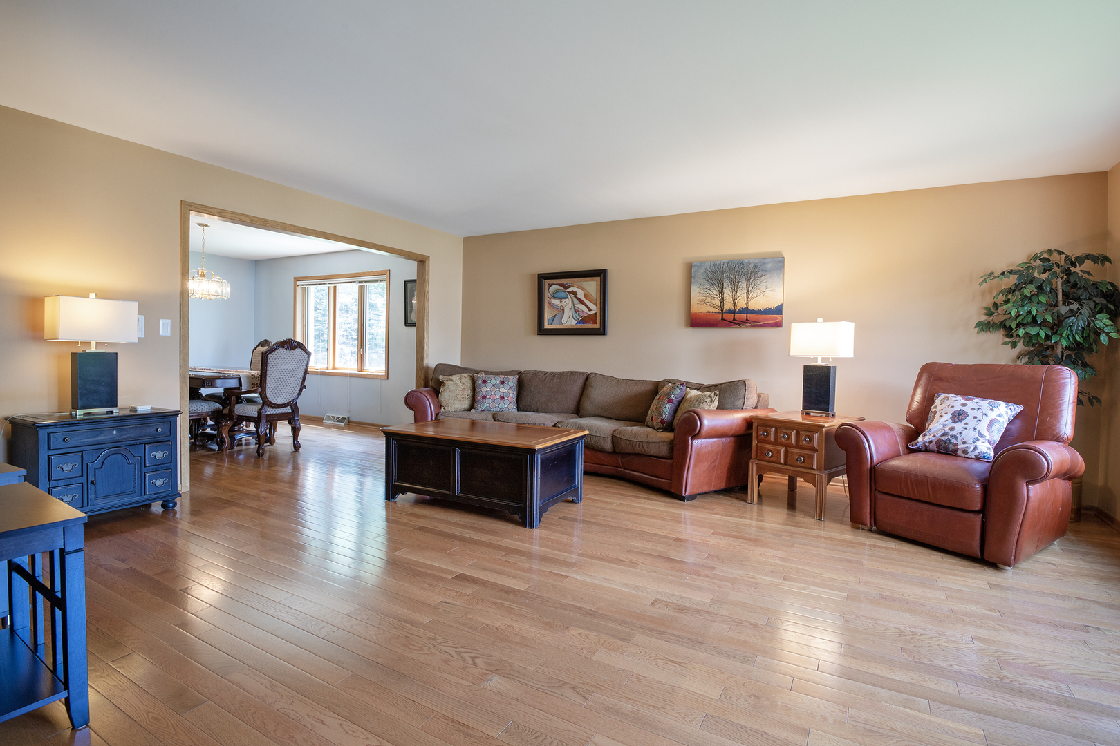 809 Tide Court Wheeling, IL 60090 - Photo 3 of 21 a living room with furniture and wooden floor