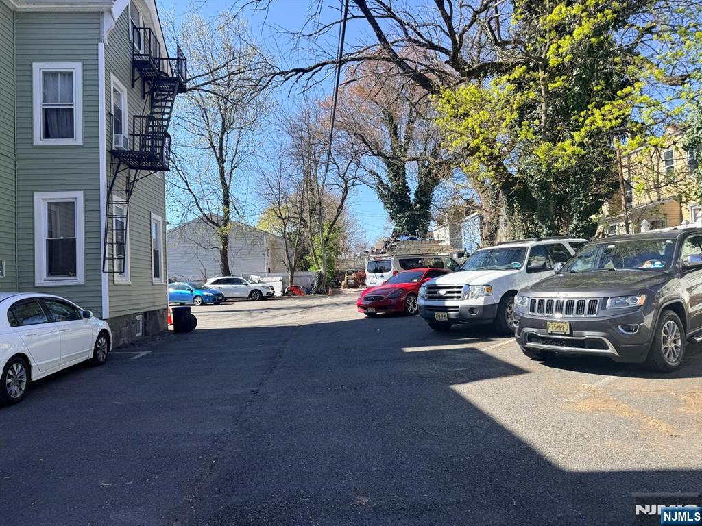 318 White Street Orange, NJ 07050 - Photo 3 of 8 a view of street with parked cars