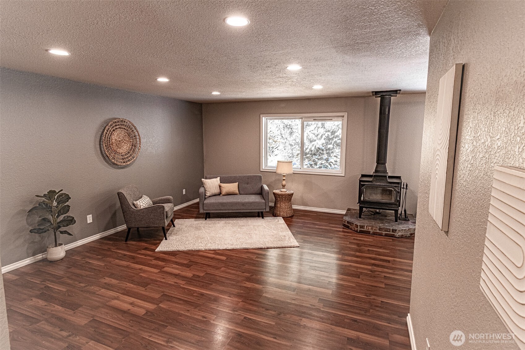 660 Peter Hagen Road West Seabeck, WA 98380 - Photo 13 of 39 a living room with furniture and a flat screen tv