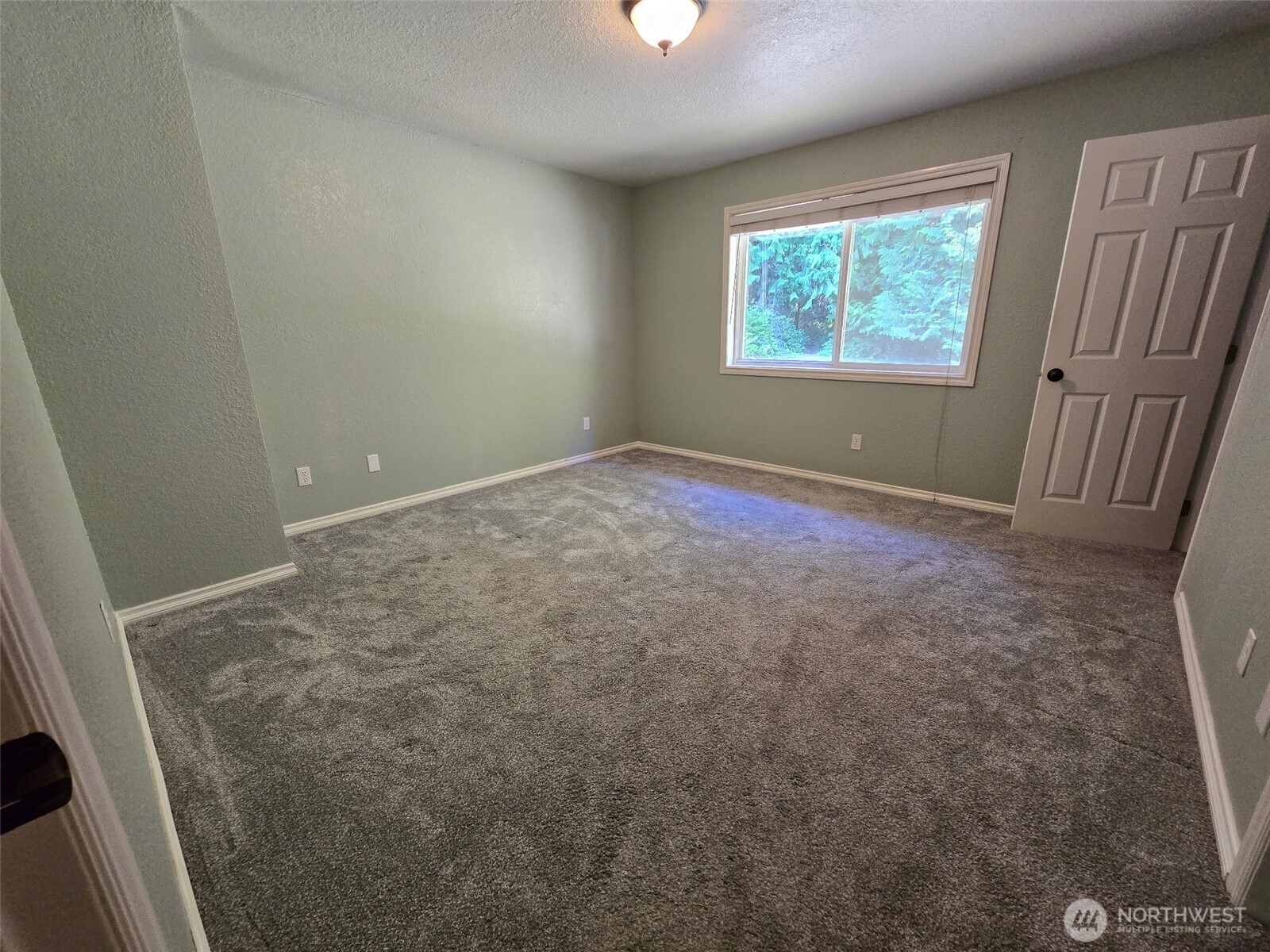 660 Peter Hagen Road West Seabeck, WA 98380 - Photo 20 of 39 an empty room with windows