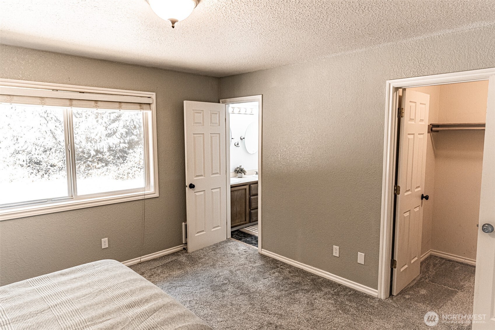 660 Peter Hagen Road West Seabeck, WA 98380 - Photo 22 of 39 a view of an empty room with a window
