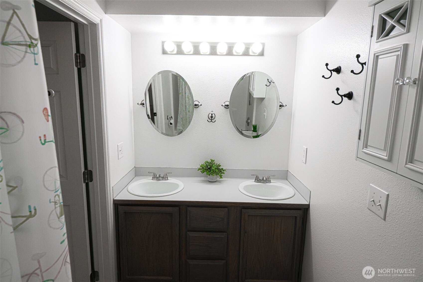 660 Peter Hagen Road West Seabeck, WA 98380 - Photo 31 of 39 a bathroom with a sink and a mirror