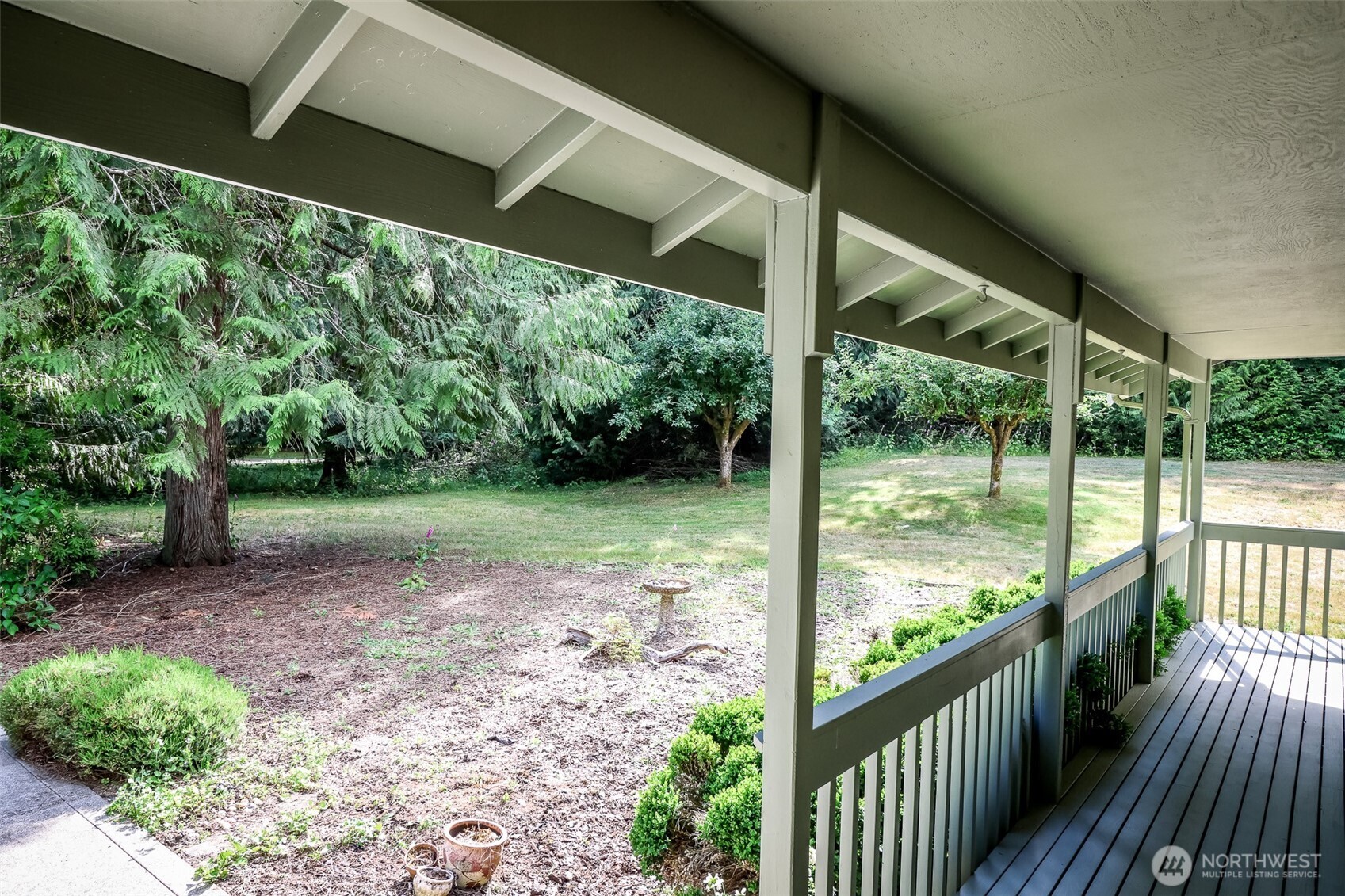 660 Peter Hagen Road West Seabeck, WA 98380 - Photo 9 of 39 a view of a porch with wooden floor
