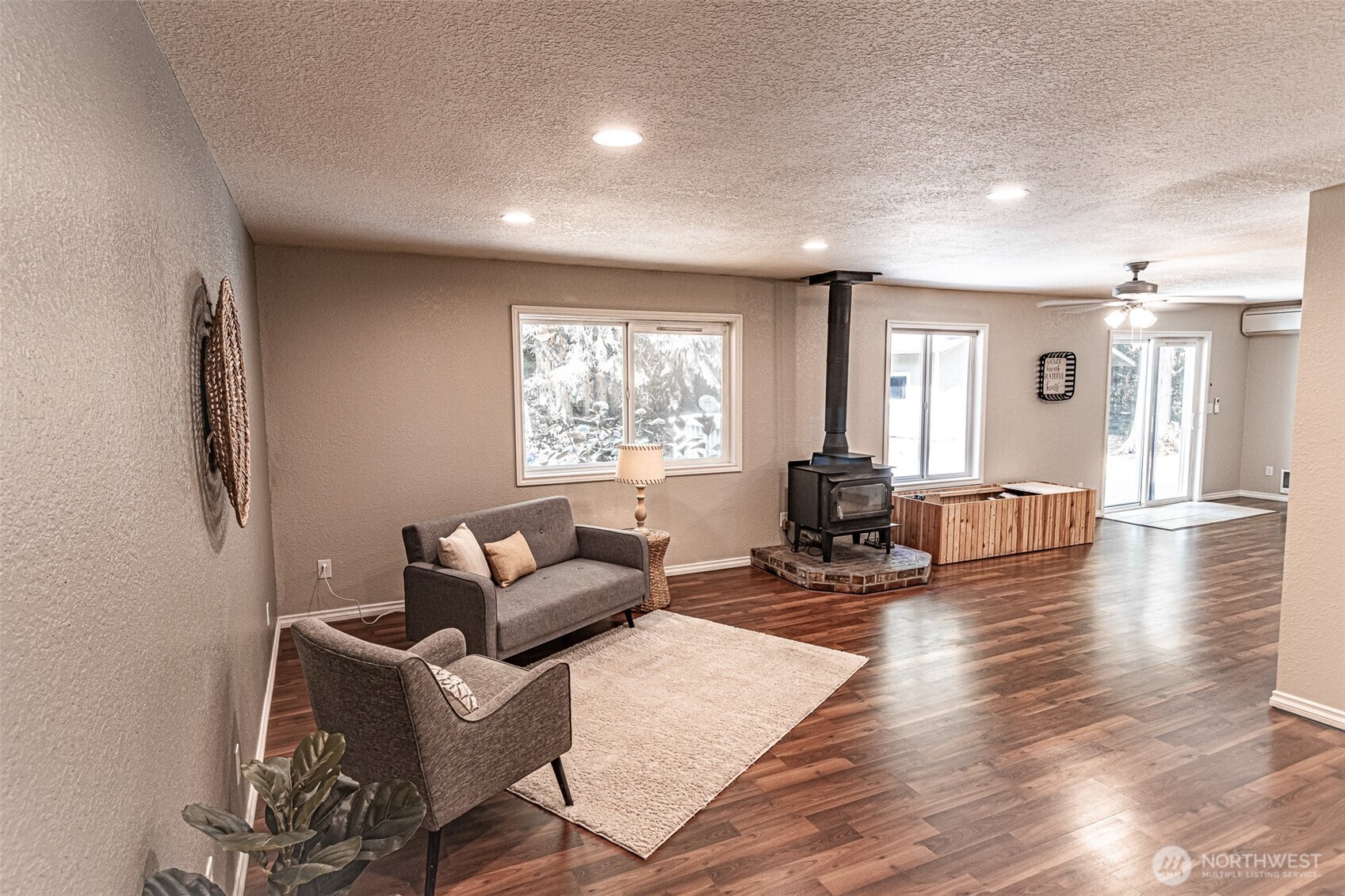 660 Peter Hagen Road West Seabeck, WA 98380 - Photo 10 of 39 a living room with furniture window and wooden floor