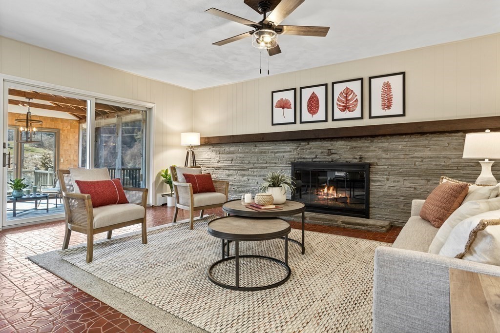 62 Westcott Road Harvard, MA 01451 - Photo 17 of 42 a living room with furniture and a fireplace