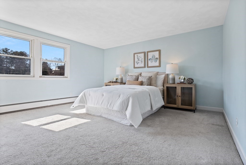 62 Westcott Road Harvard, MA 01451 - Photo 20 of 42 a bedroom with a bed and lamp