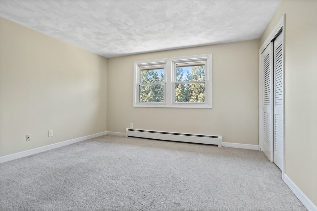 62 Westcott Road Harvard, MA 01451 - Photo 26 of 42 an empty room with windows