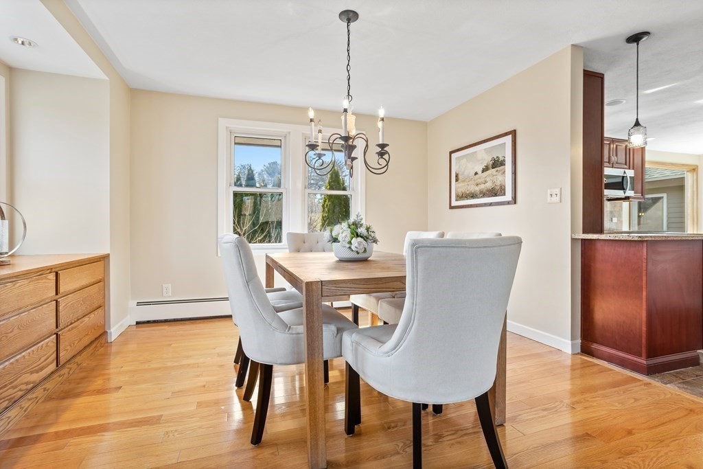 62 Westcott Road Harvard, MA 01451 - Photo 8 of 42 a view of a dining room with furniture window and wooden floor