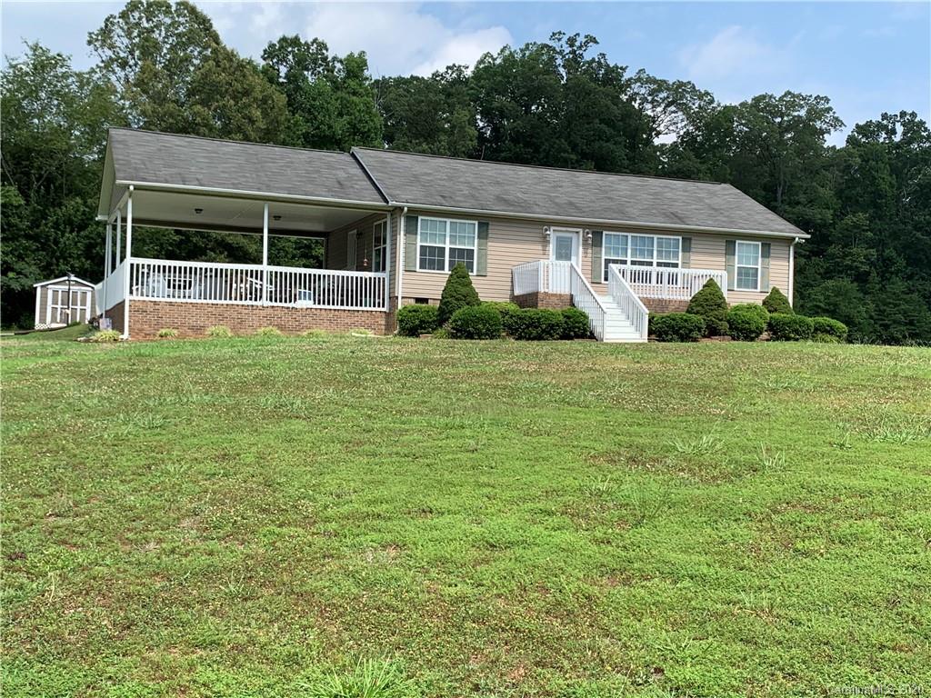 1650 Maple Creek Road Rutherfordton, NC 28139 - Photo 5 of 7 a front view of a house with a yard