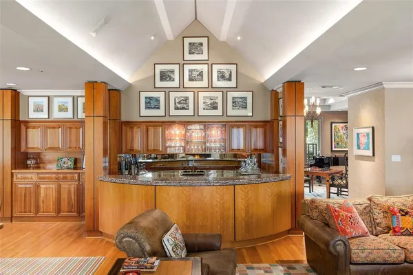 a view of a living room and kitchen