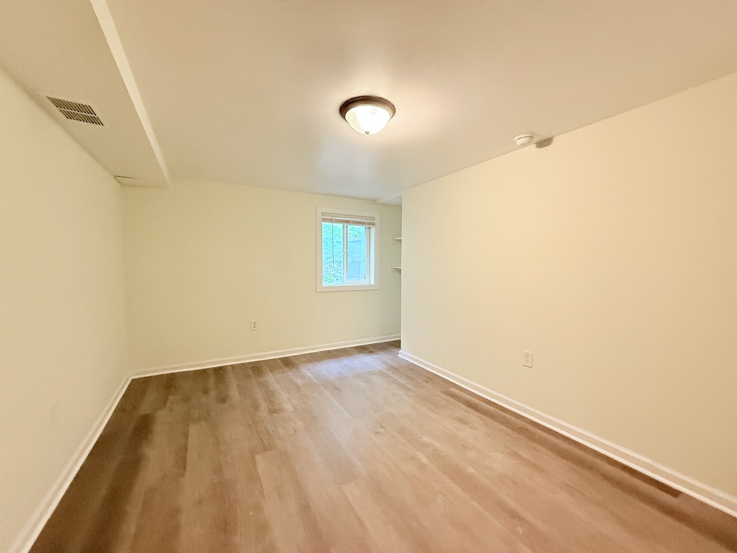 17511 Maple Avenue Lansing, IL 60438 - Photo 19 of 24 an empty room with a window
