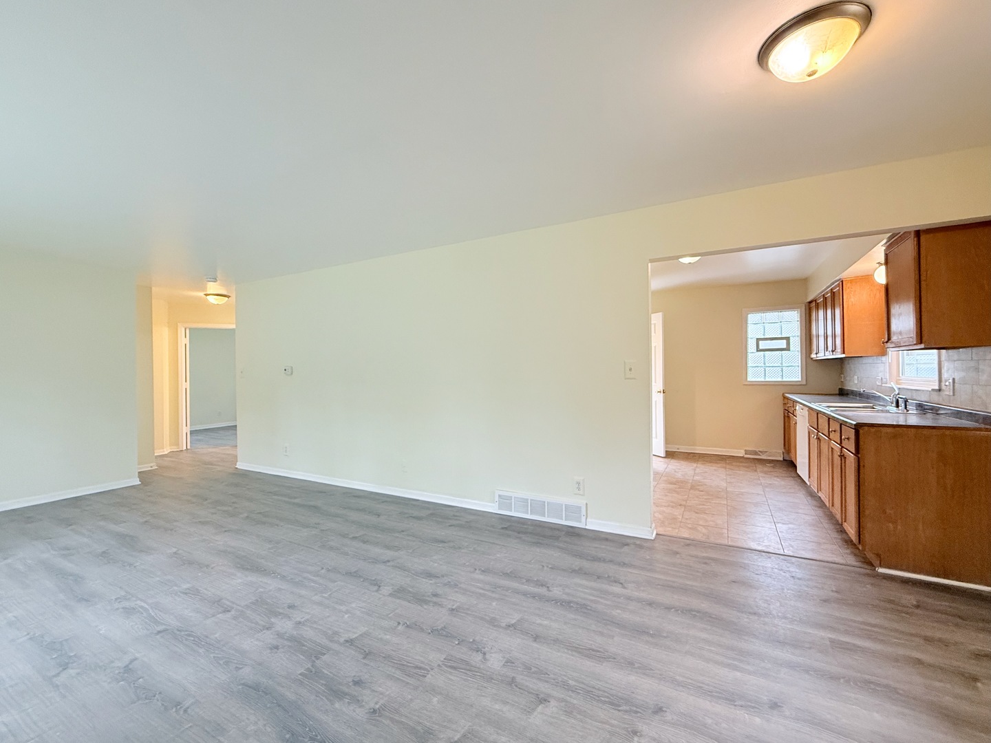 17511 Maple Avenue Lansing, IL 60438 - Photo 2 of 24 a view of a kitchen and a window