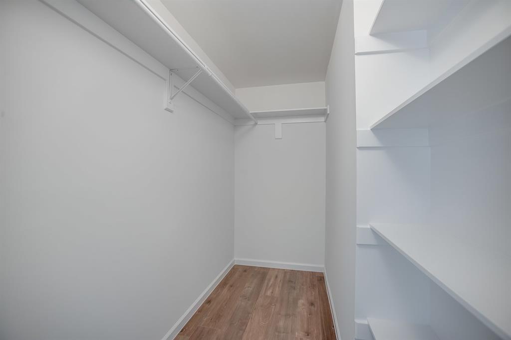 1809 Bennett Avenue, Unit 211 Dallas, TX 75206 - Photo 4 of 5 Spacious closet featuring light hardwood / wood-style flooring