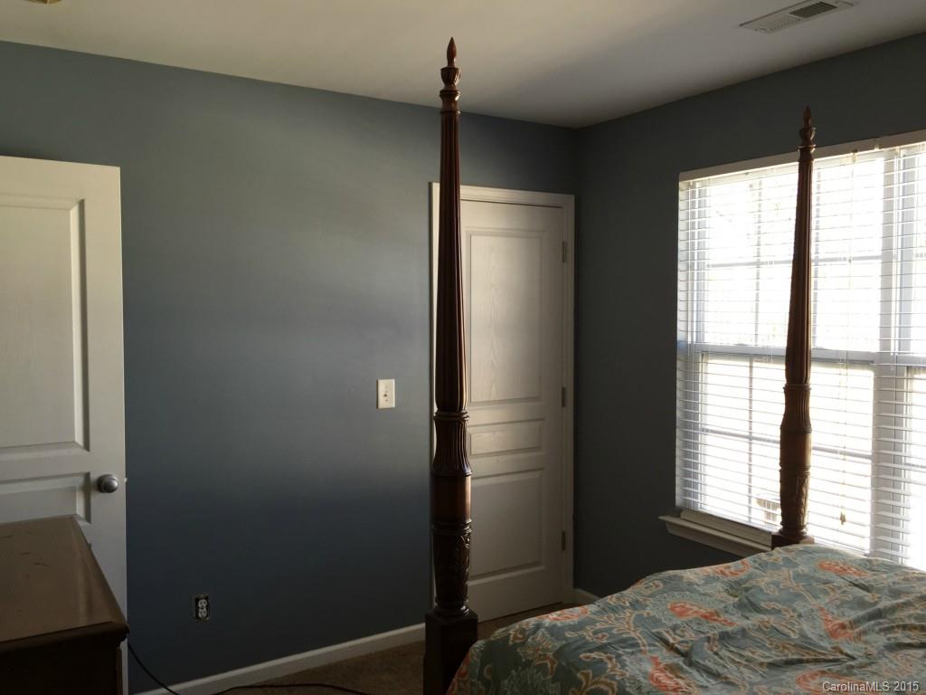 846 Gentlewinds Court, Unit 132 Fort Mill, SC 29708 - Photo 12 of 14 a bedroom with a bed and a window