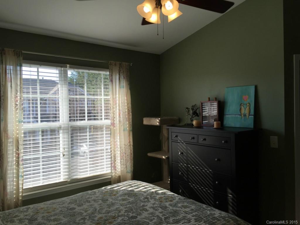 846 Gentlewinds Court, Unit 132 Fort Mill, SC 29708 - Photo 8 of 14 a bedroom with a bed and a window