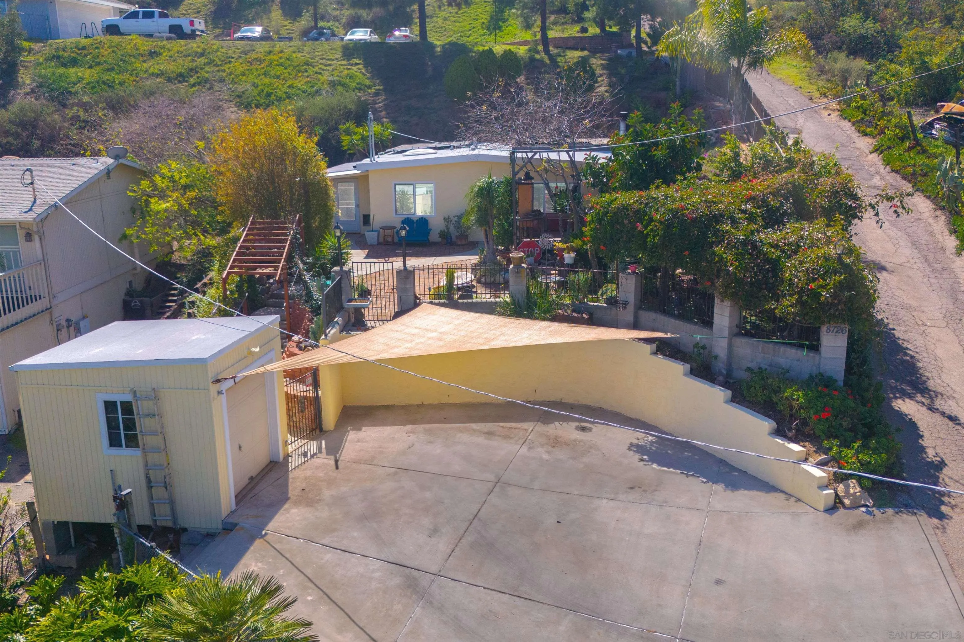 8726 Golden Ridge Road Lakeside, CA 92040 - Photo 22 of 23 a view of a house with backyard and sitting area