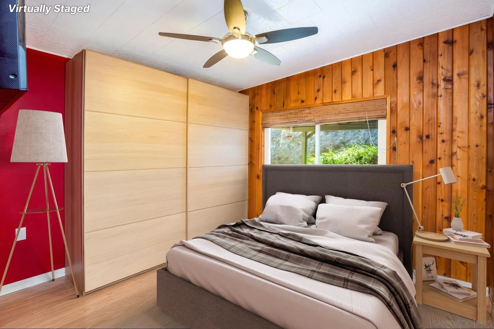 8726 Golden Ridge Road Lakeside, CA 92040 - Photo 8 of 23 a bedroom with a bed and a chandelier