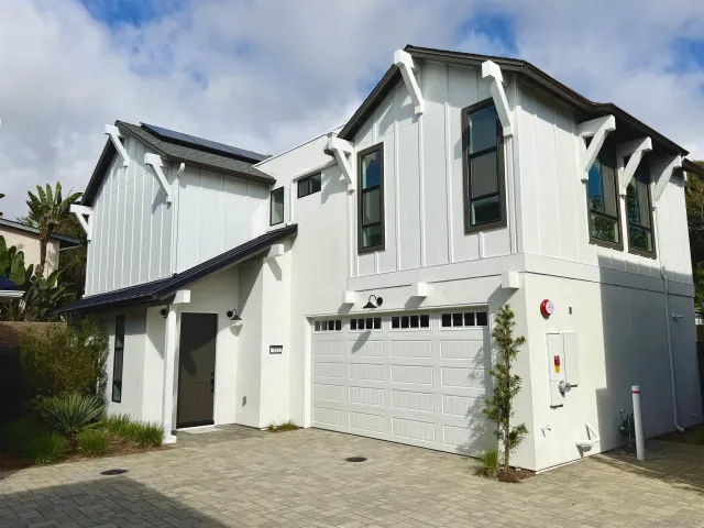 a white house with a outdoor space
