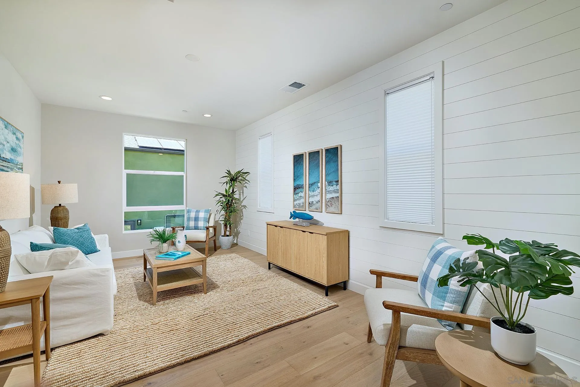 553 North Vulcan Avenue Encinitas, CA 92024 - Photo 7 of 21 a living room with furniture potted plant and a window