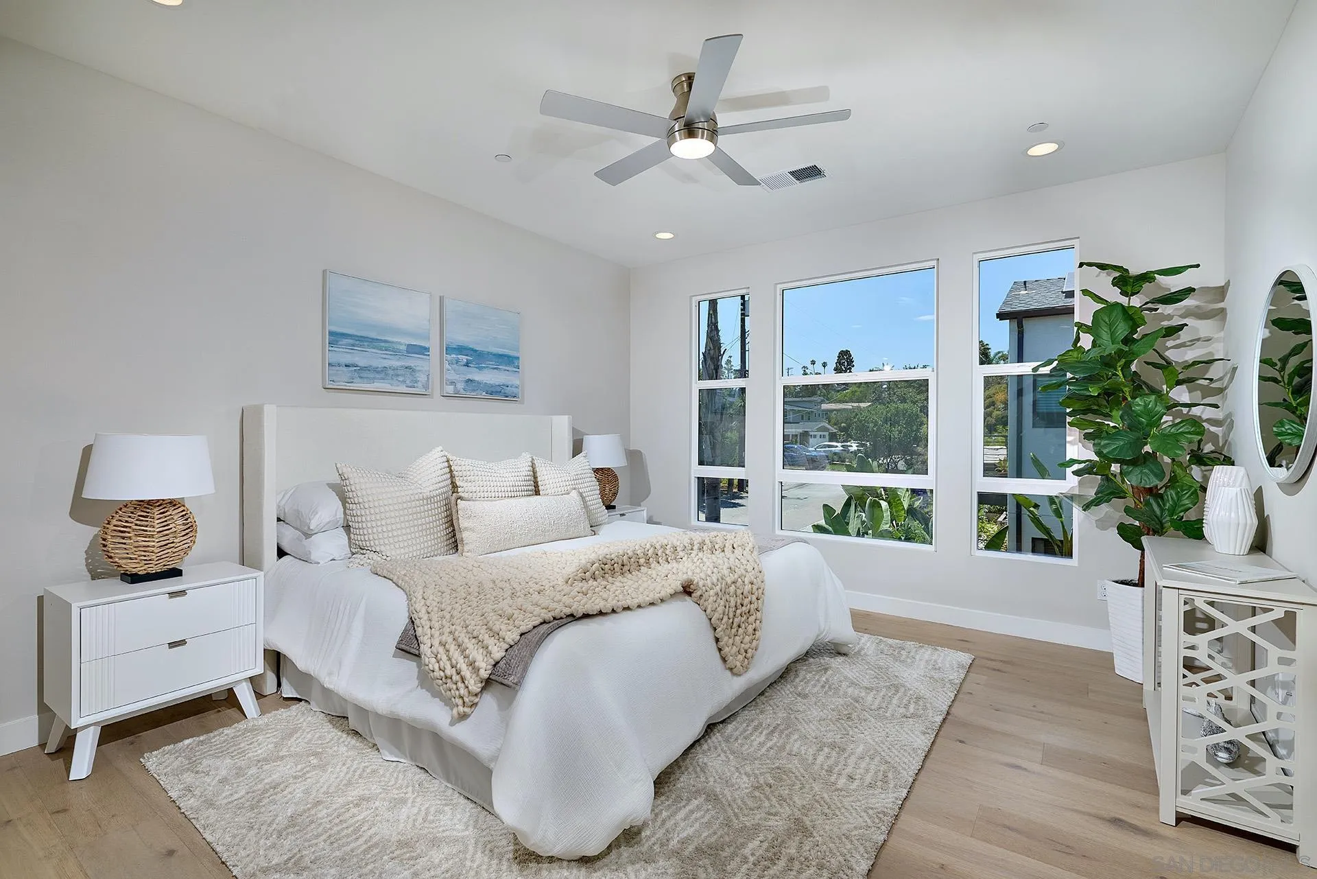 553 North Vulcan Avenue Encinitas, CA 92024 - Photo 9 of 21 a bedroom with a large bed and a window