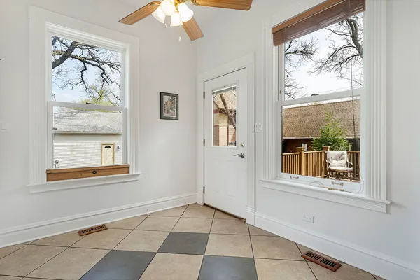 a view of an empty room with a window