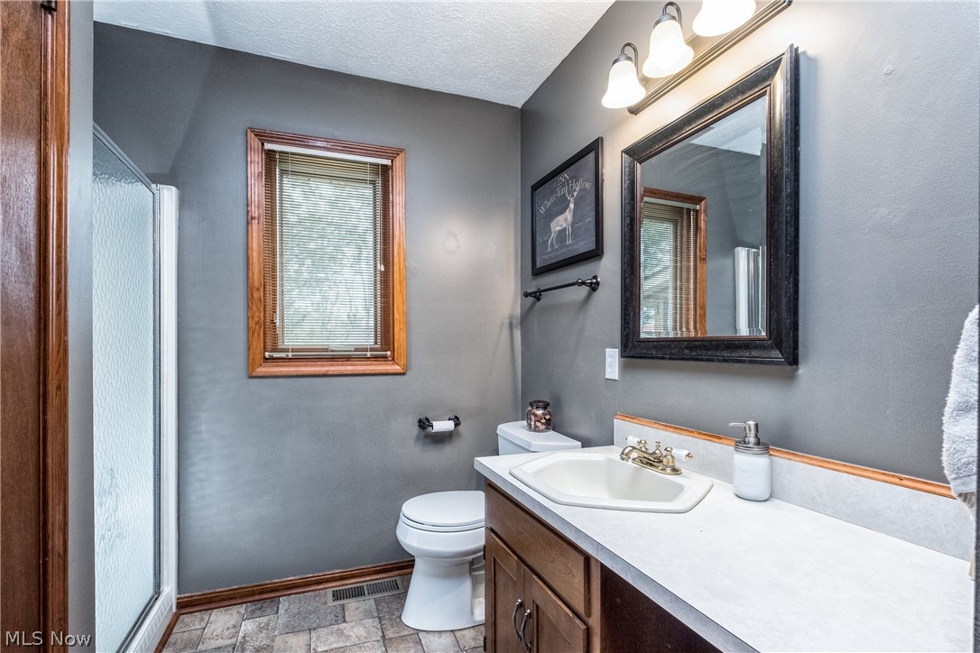 1762 Killian Road Akron, OH 44312 - Photo 12 of 20 First floor full bath with step in shower