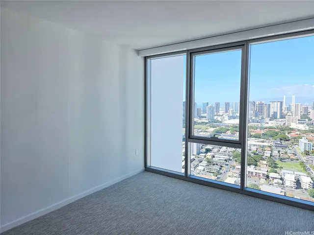 a view of a room with a large window