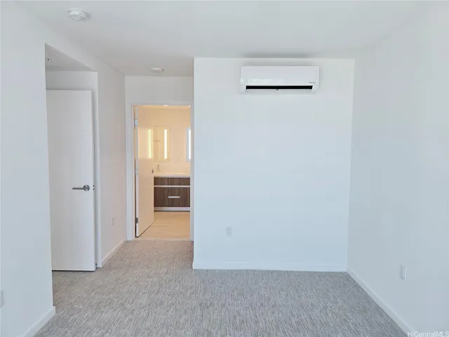 a view of a hallway with a kitchen