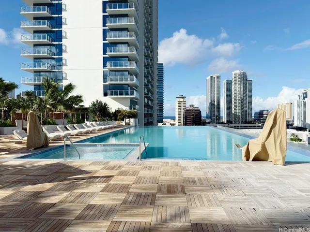 a view of a swimming pool with a terrace