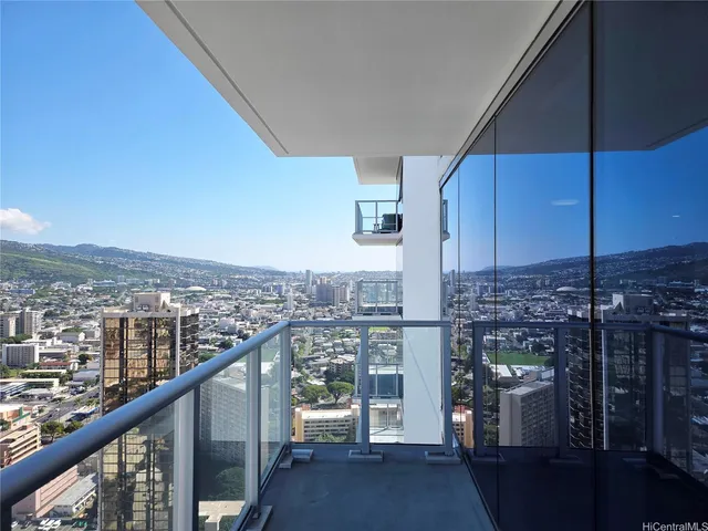 a view of a balcony with city view