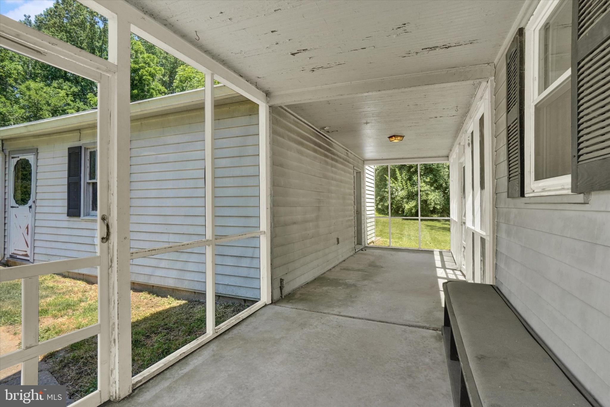 1912 Corbett Road Monkton, MD 21111 - Photo 18 of 46 Screened porch with access to garage & yard.