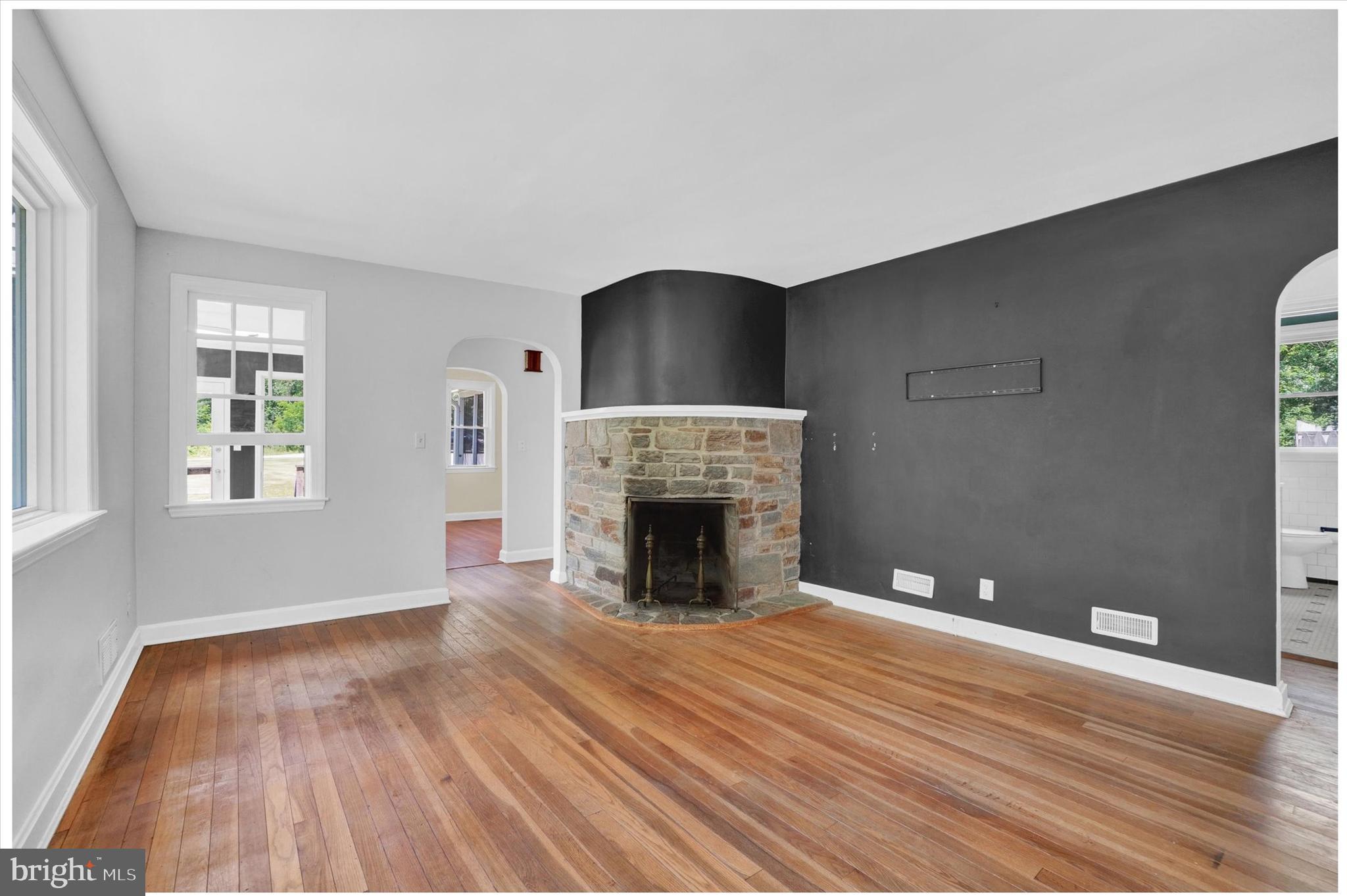1912 Corbett Road Monkton, MD 21111 - Photo 6 of 46 Unique stone fireplace in the cozy living room
