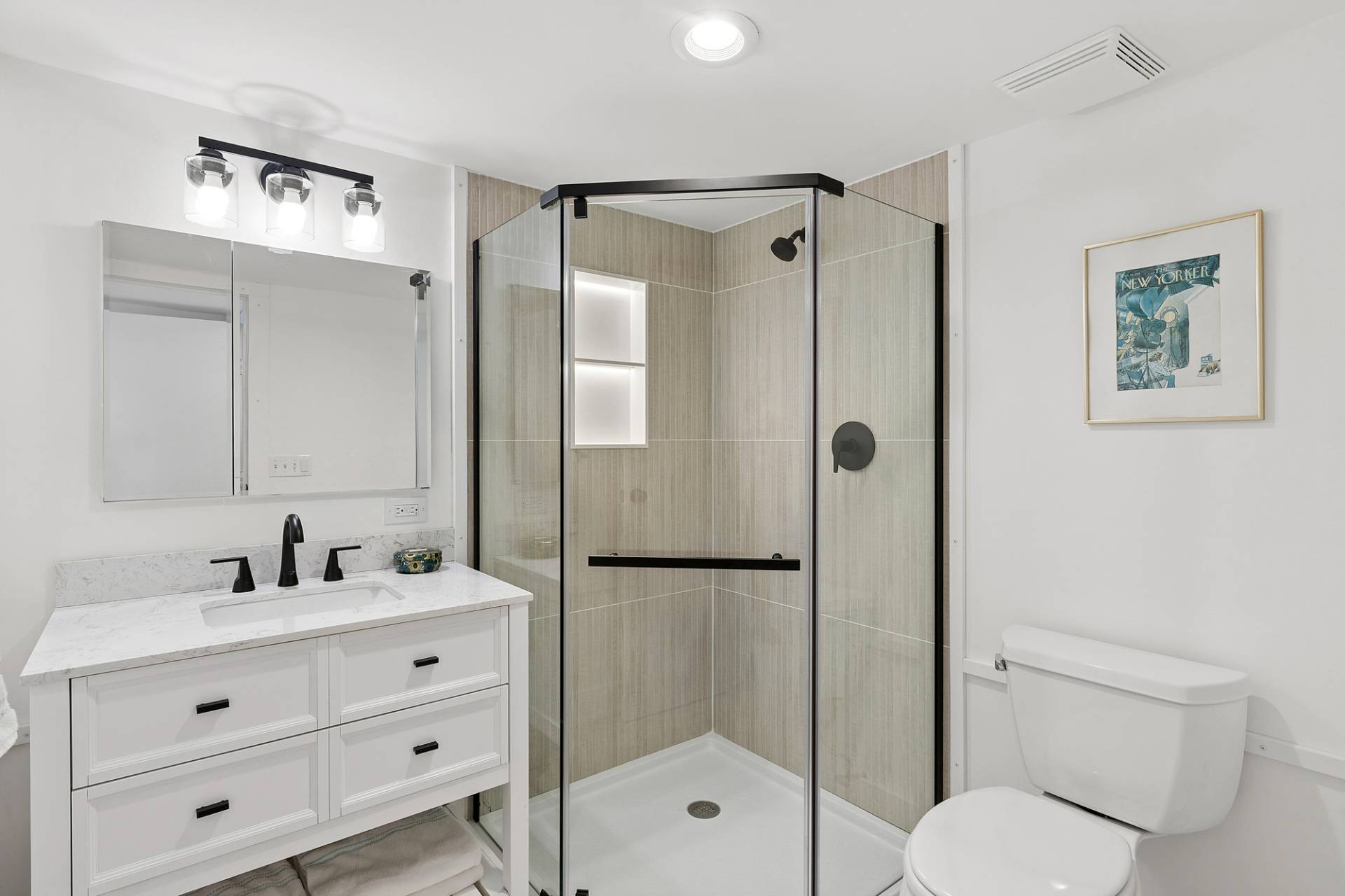3004 Mitchell Road Westhampton Beach, NY 11978 - Photo 13 of 24 a bathroom with a shower sink vanity mirror and shower