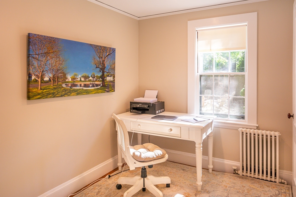 94 Atlantic Avenue, Unit 1 Cohasset, MA 02025 - Photo 15 of 23 a room with a table and a window