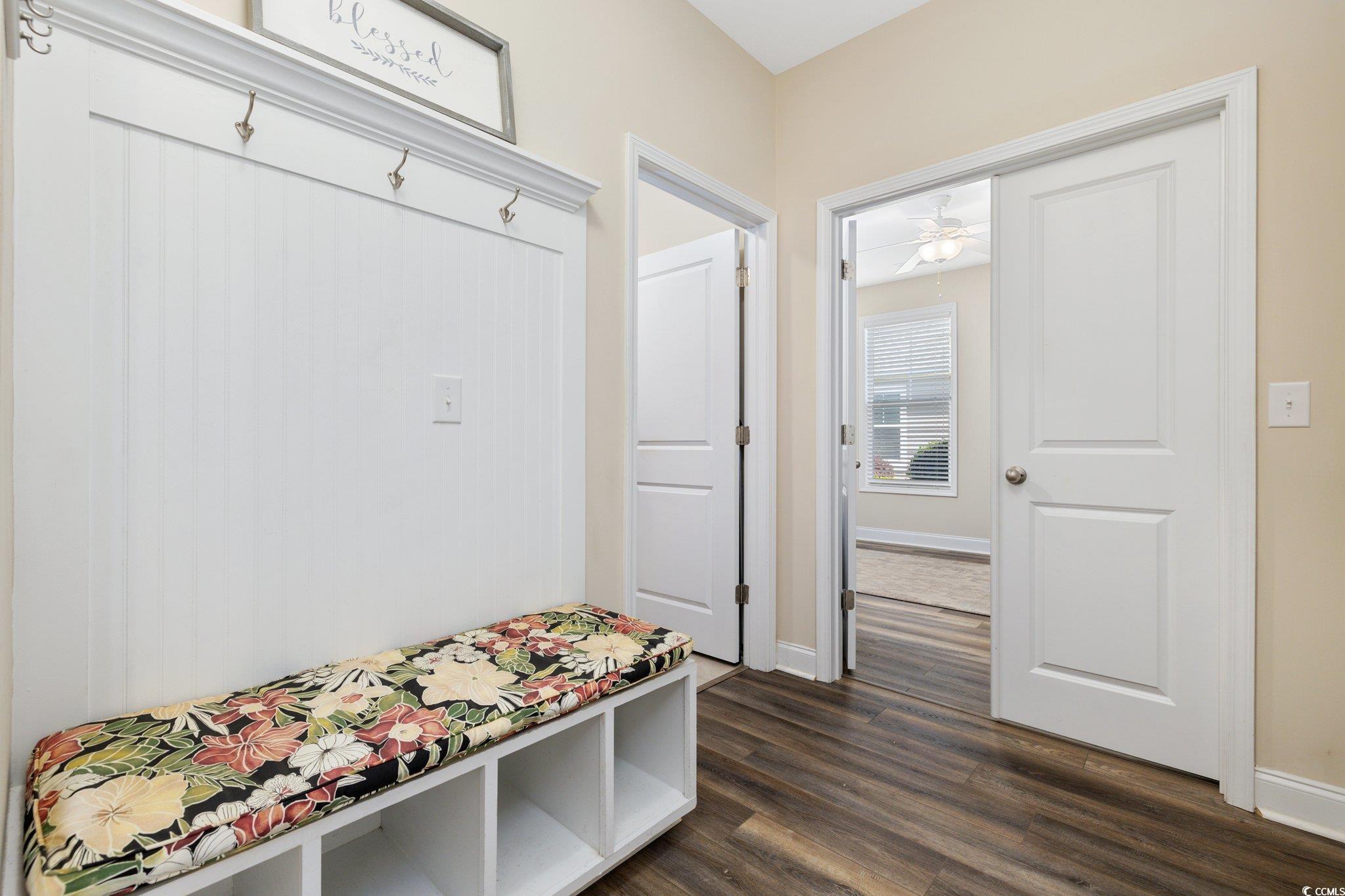 179 Hyacinth Loop Murrells Inlet, SC 29576 - Photo 22 of 40 Mudroom featuring baseboards and dark wood-style floors