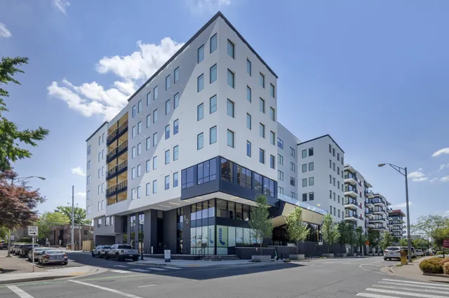 a view of a building and a street