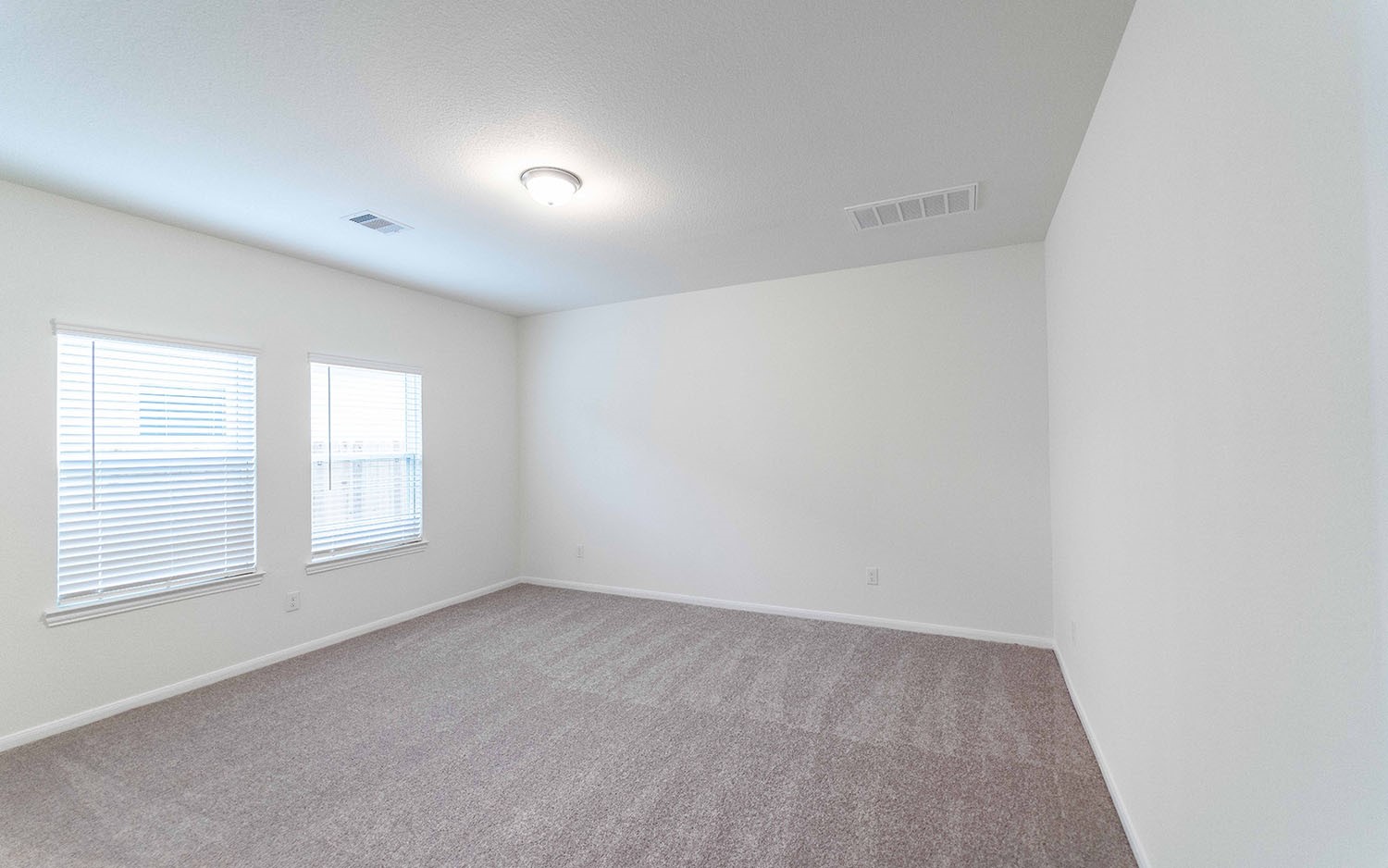10604 Altitude Way Conroe, TX 77303 - Photo 11 of 33 an empty room with windows