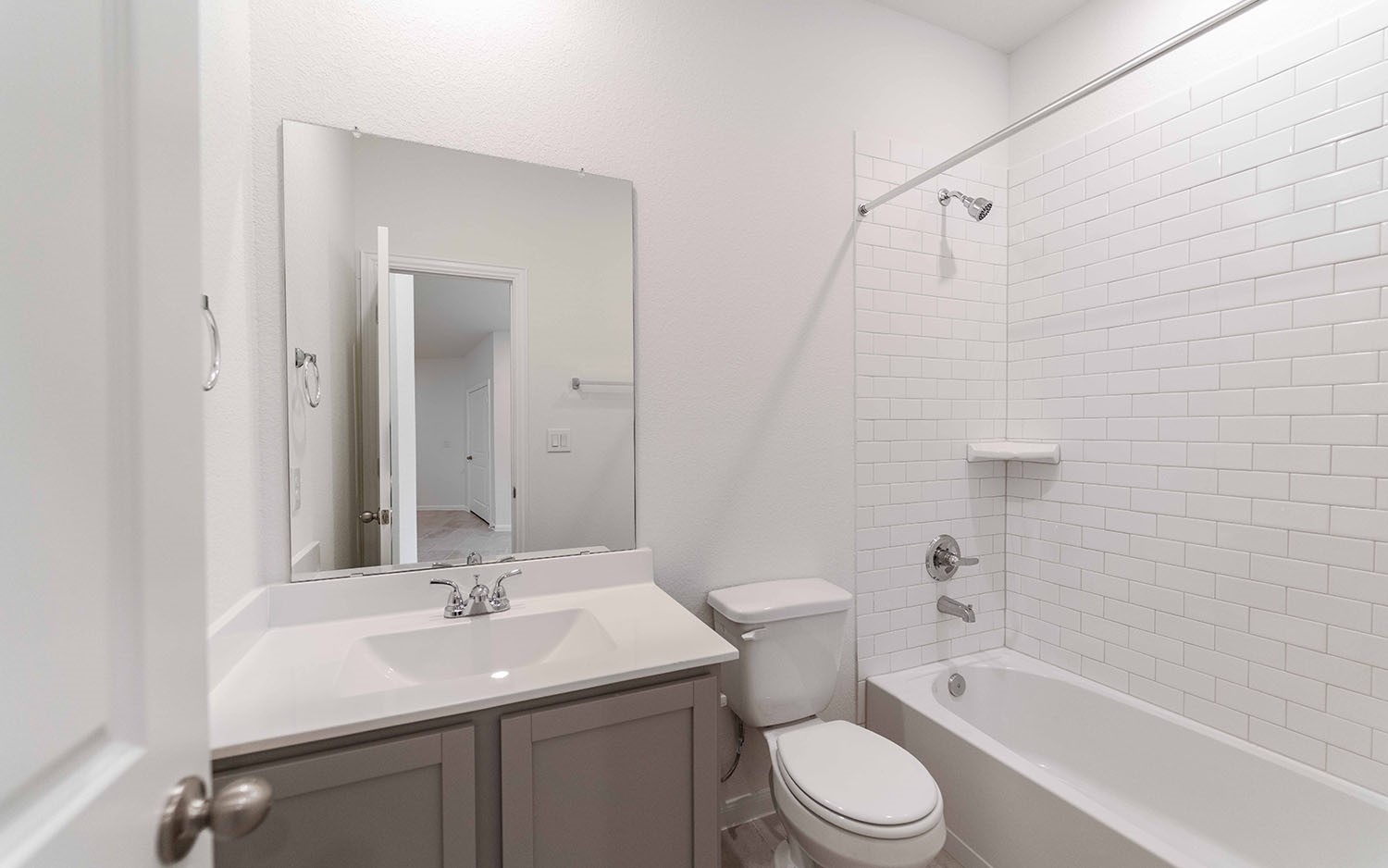 10604 Altitude Way Conroe, TX 77303 - Photo 16 of 33 a bathroom with a sink toilet and shower