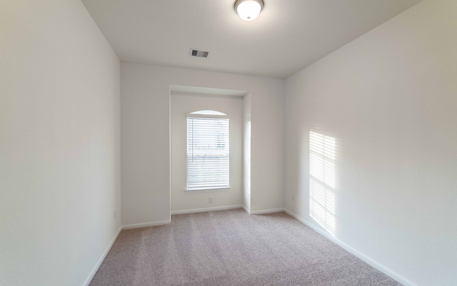 10604 Altitude Way Conroe, TX 77303 - Photo 17 of 33 an empty room with windows