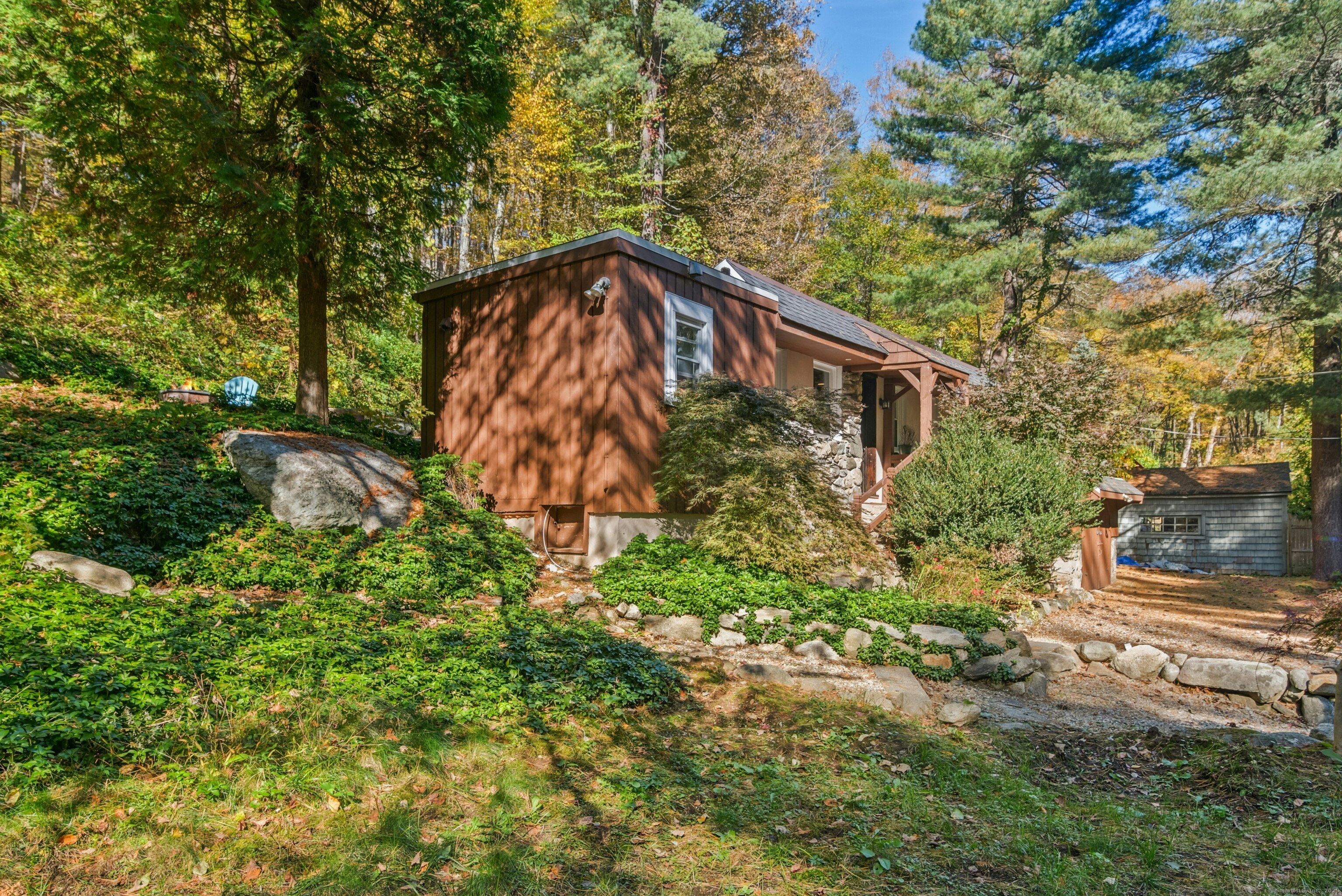 492 Newtown Turnpike Weston, CT 06883 - Photo 1 of 10 a backyard of a house with lots of green space
