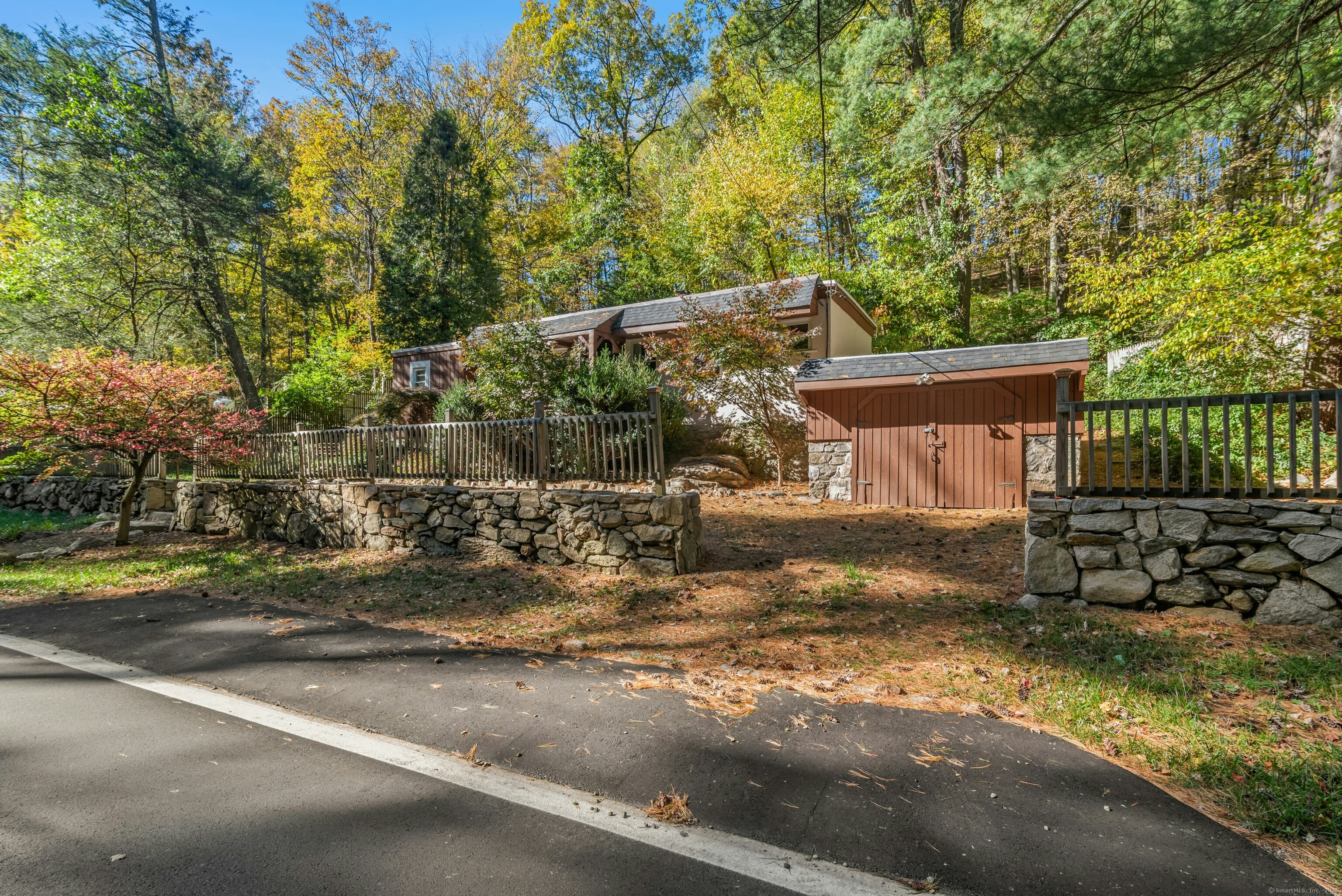 492 Newtown Turnpike Weston, CT 06883 - Photo 2 of 10 a view of a house with a yard