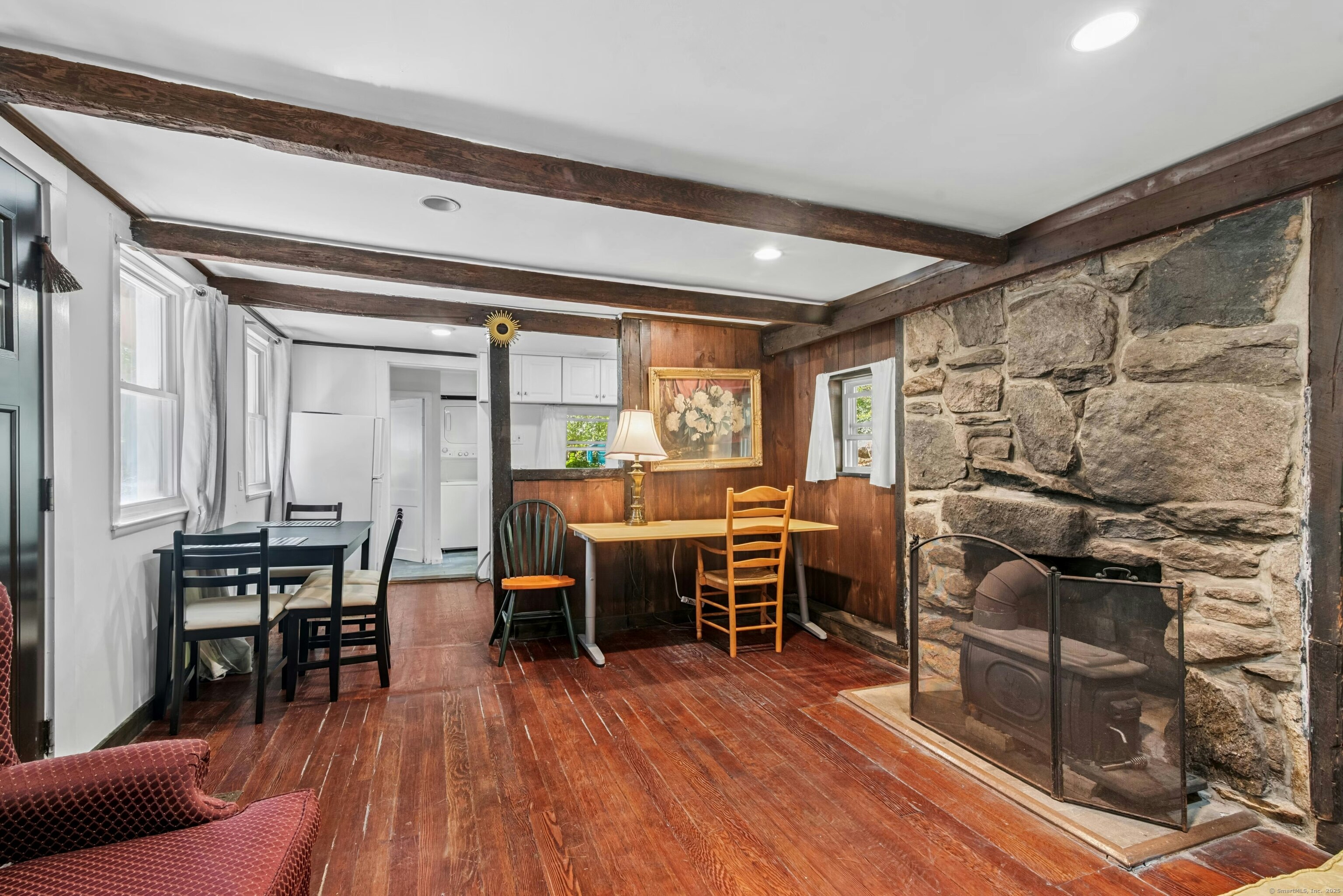 492 Newtown Turnpike Weston, CT 06883 - Photo 4 of 10 a dining room with furniture and wooden floor