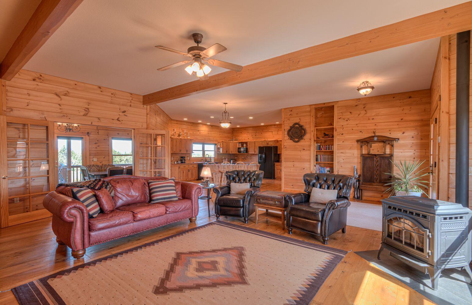 10000 Southwest Lyons Drive Culver, OR 97734 - Photo 17 of 90 a living room with furniture and a large window